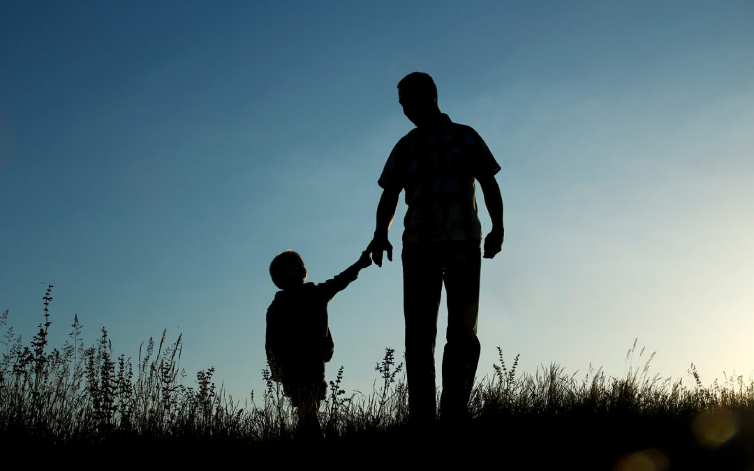 father and son walking, silhouette, positive development psychology